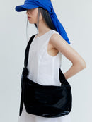 GLOSSY HALFMOON CROSS BAG