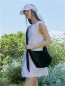 GLOSSY HALFMOON CROSS BAG