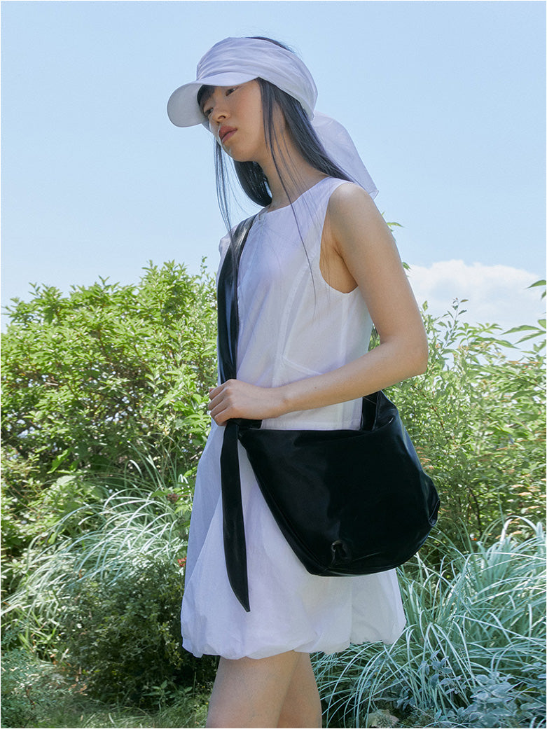GLOSSY HALFMOON CROSS BAG