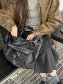 GLOSSY MID TANGLE TWIST BAG