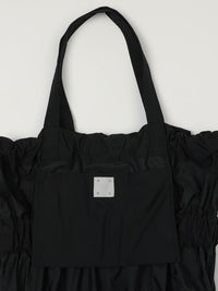 TIERED BANDING BACKPACK
