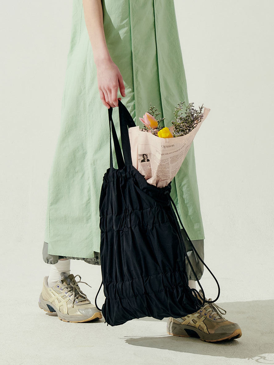 TIERED BANDING BACKPACK