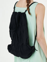 TIERED BANDING BACKPACK