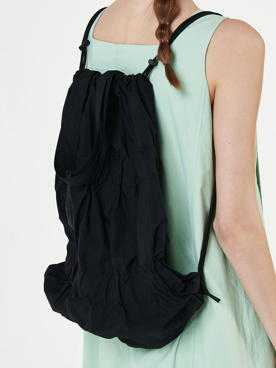 TIERED BANDING BACKPACK