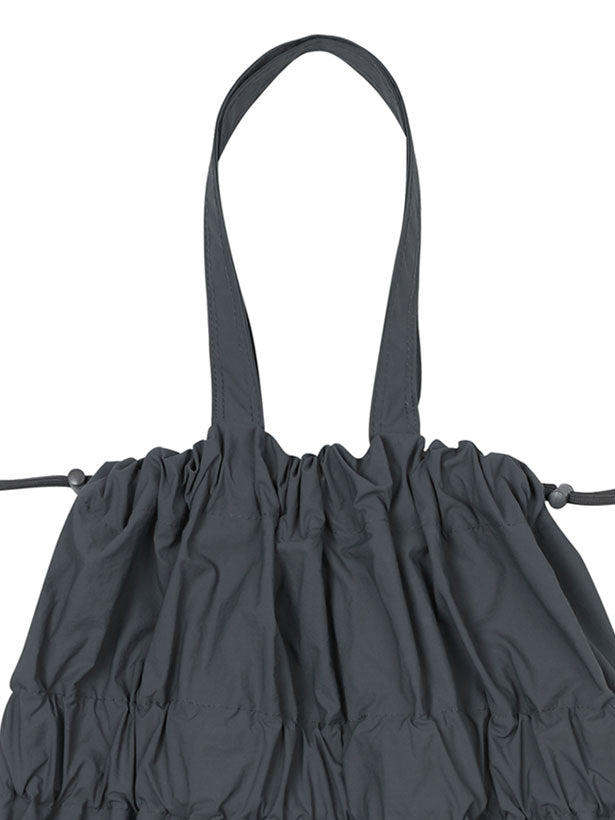 TIERED BANDING BACKPACK