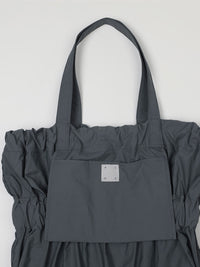 TIERED BANDING BACKPACK