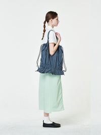TIERED BANDING BACKPACK