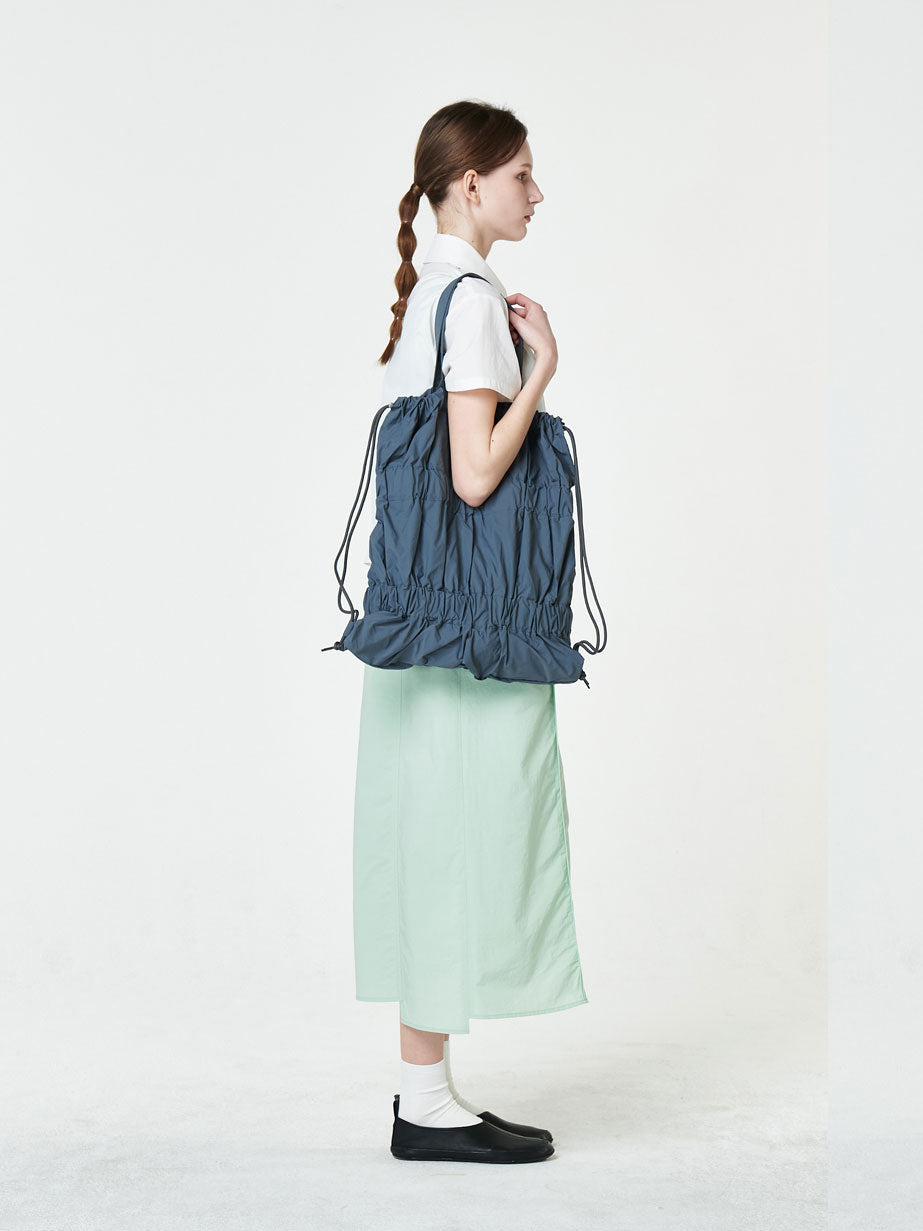 TIERED BANDING BACKPACK
