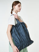 TIERED BANDING BACKPACK