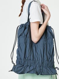TIERED BANDING BACKPACK