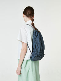 TIERED BANDING BACKPACK