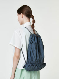 TIERED BANDING BACKPACK