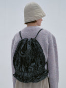 TIERED BANDING BACKPACK