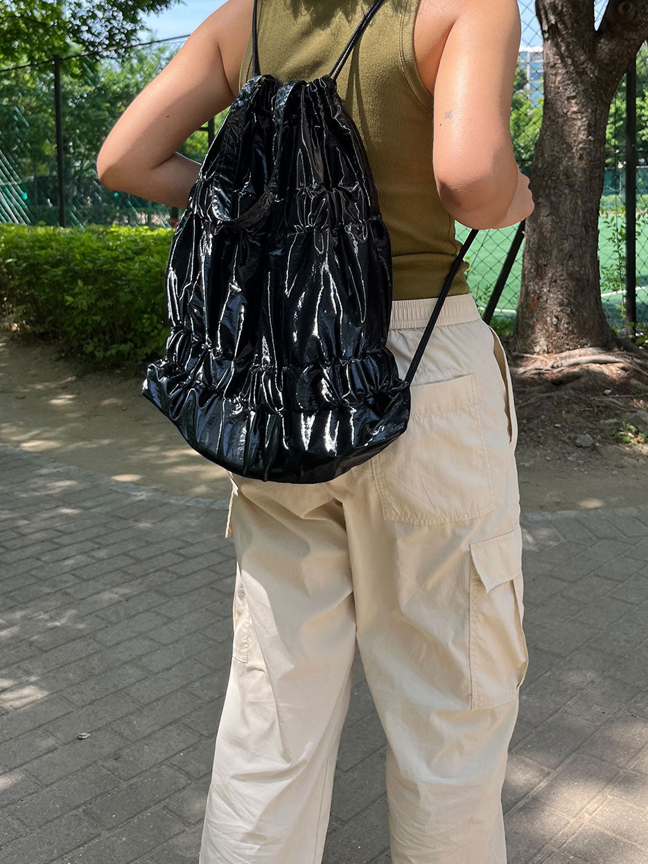 TIERED BANDING BACKPACK