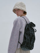 TIERED BANDING BACKPACK