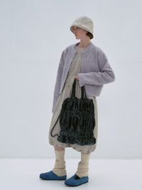 TIERED BANDING BACKPACK