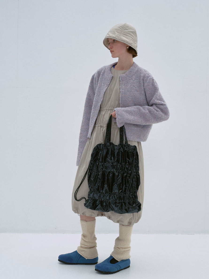 TIERED BANDING BACKPACK