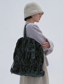 TIERED BANDING BACKPACK