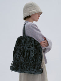 TIERED BANDING BACKPACK