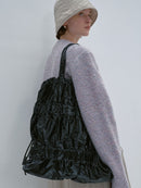TIERED BANDING BACKPACK