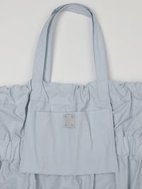 TIERED BANDING BACKPACK