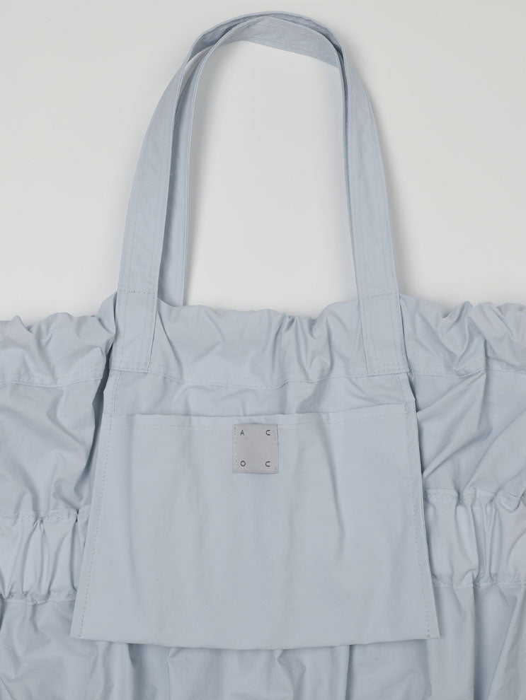TIERED BANDING BACKPACK