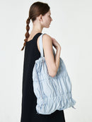 TIERED BANDING BACKPACK
