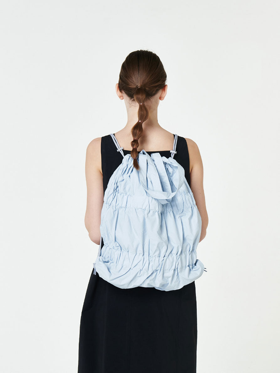TIERED BANDING BACKPACK