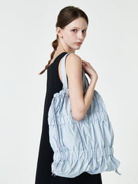 TIERED BANDING BACKPACK