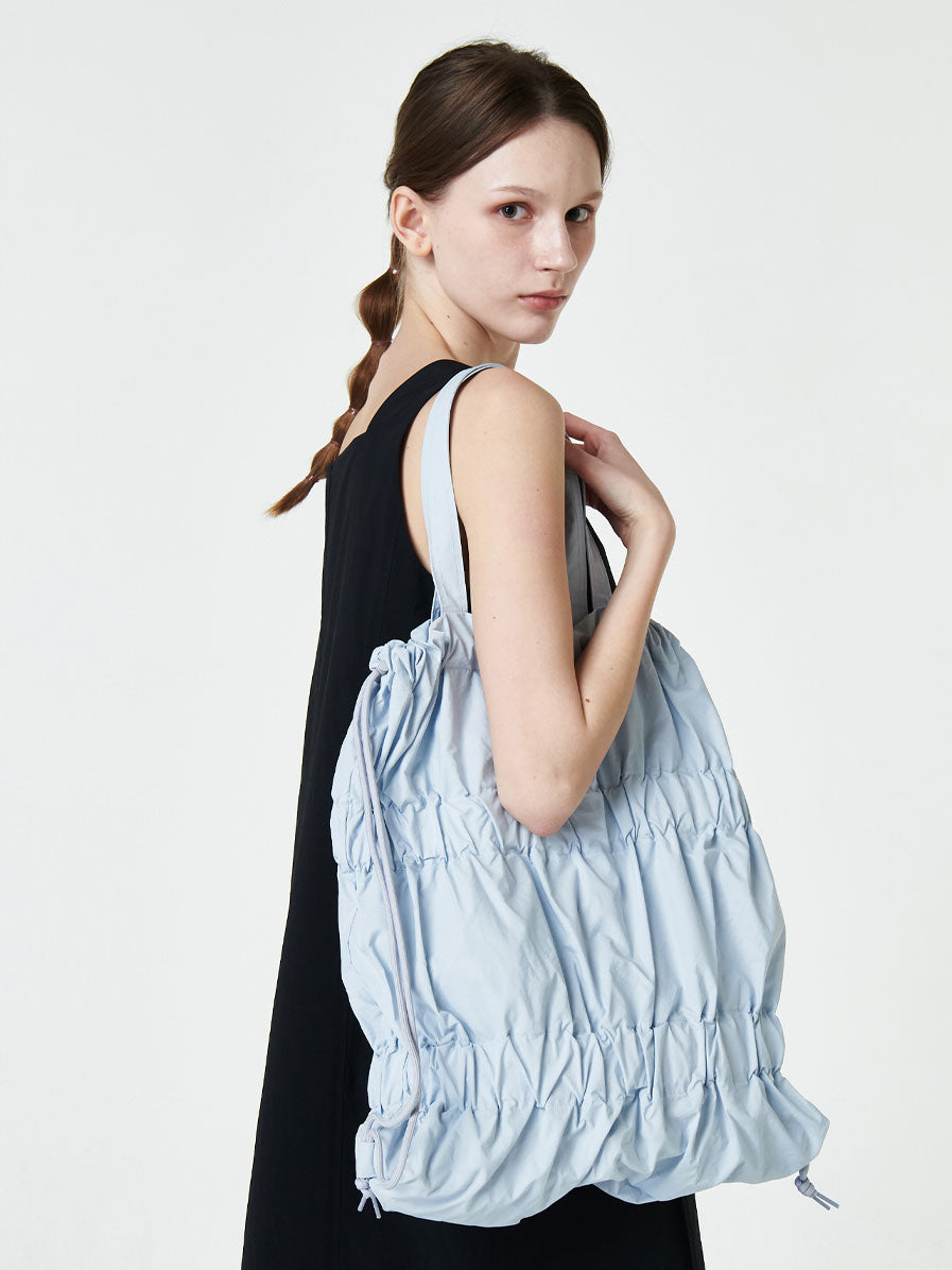 TIERED BANDING BACKPACK
