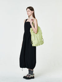 TIERED BANDING BACKPACK