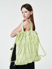 TIERED BANDING BACKPACK