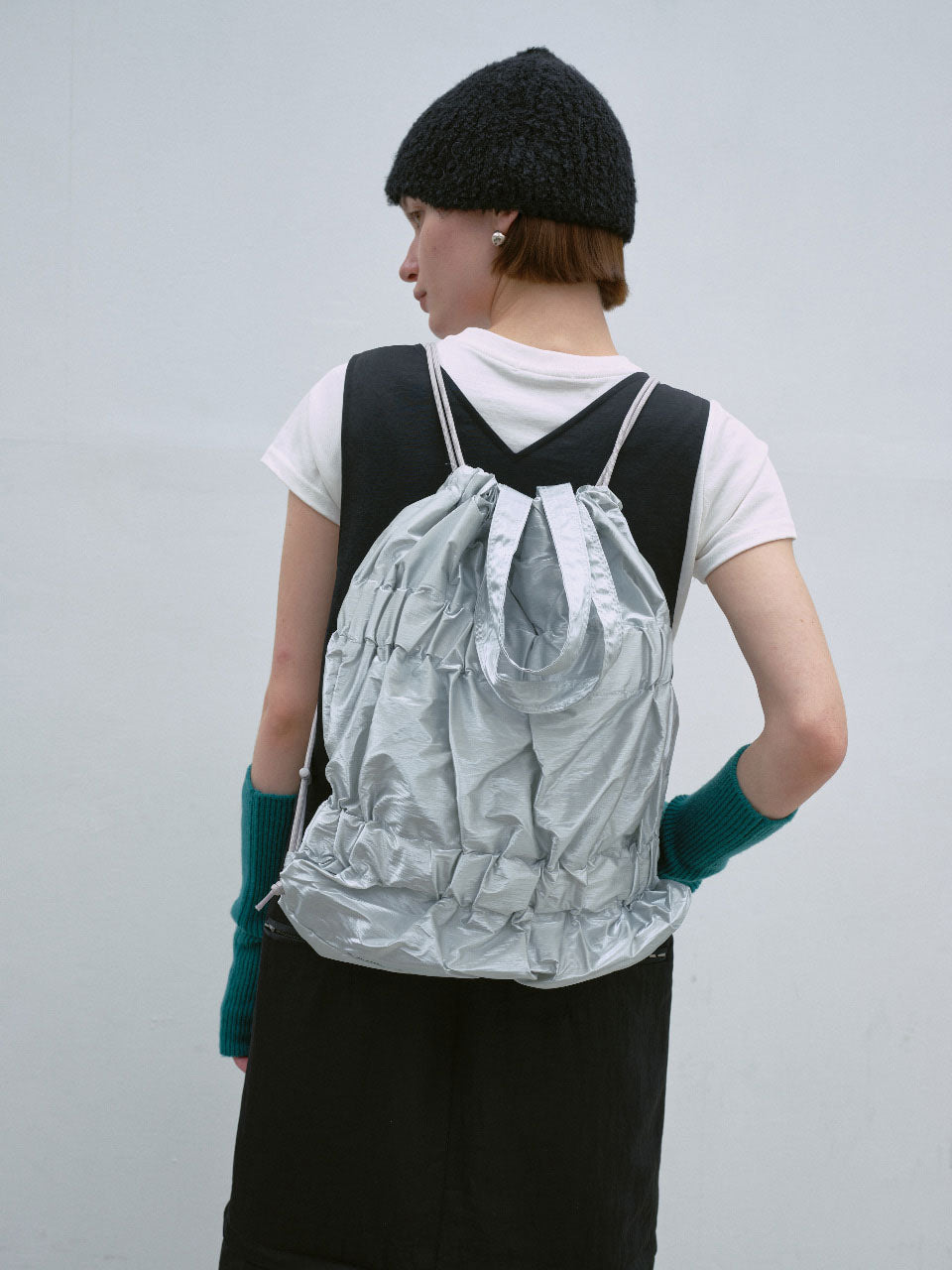 TIERED BANDING BACKPACK