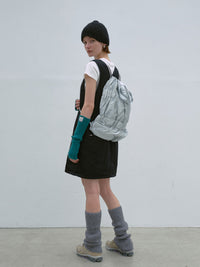 TIERED BANDING BACKPACK
