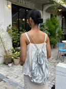 TIERED BANDING BACKPACK