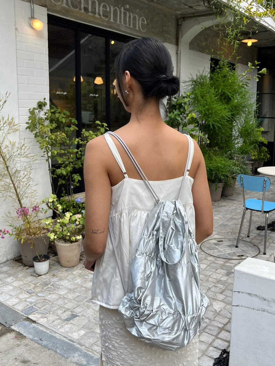 TIERED BANDING BACKPACK
