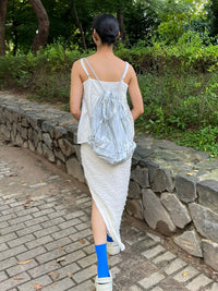 TIERED BANDING BACKPACK
