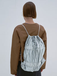 TIERED BANDING BACKPACK