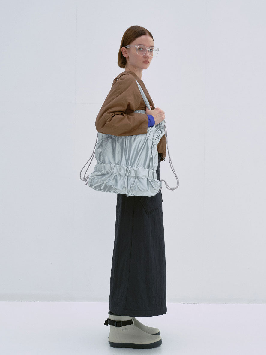 TIERED BANDING BACKPACK