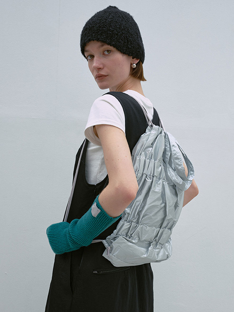TIERED BANDING BACKPACK