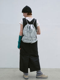 TIERED BANDING BACKPACK