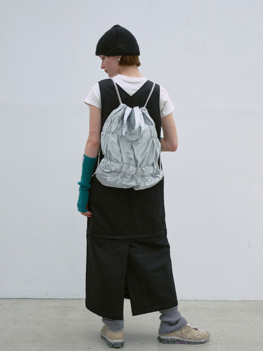 TIERED BANDING BACKPACK